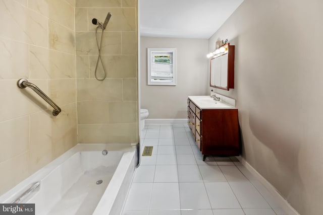 full bathroom with tiled shower / bath combo, tile patterned floors, toilet, and vanity