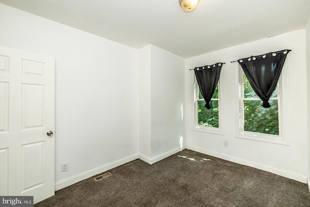 view of carpeted spare room