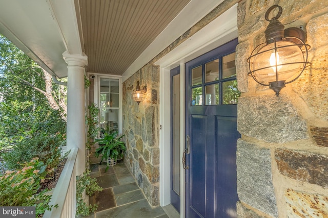 entrance to property with covered porch