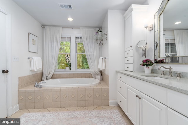 bathroom featuring visible vents, tile patterned floors, a garden tub, vanity, and recessed lighting