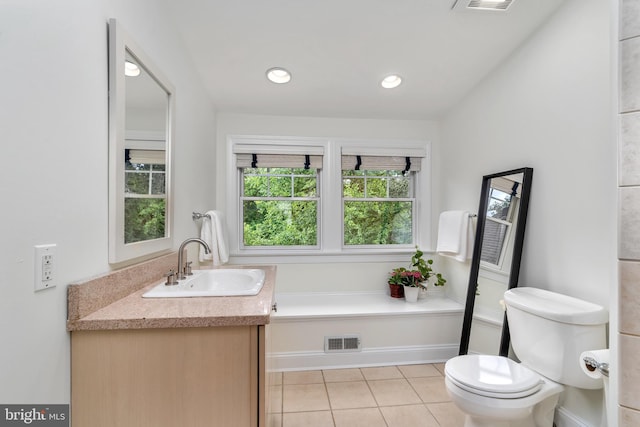 bathroom featuring visible vents, toilet, tile patterned floors, vanity, and recessed lighting