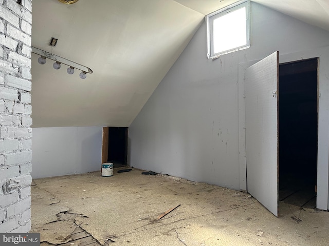 bonus room featuring lofted ceiling