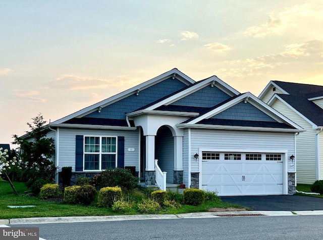 craftsman house featuring a garage