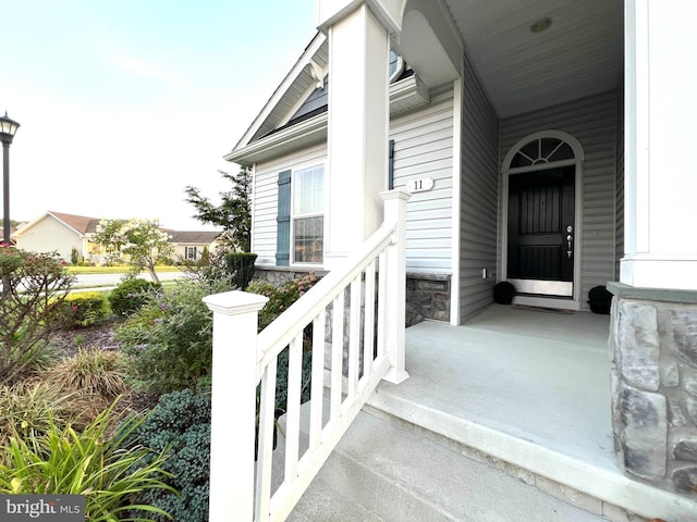 entrance to property with a porch