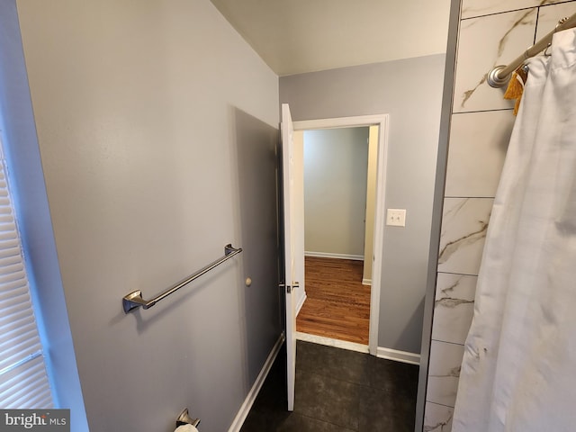 bathroom with tile patterned floors