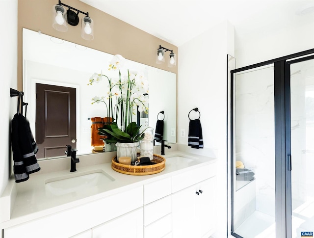 bathroom with vanity and an enclosed shower