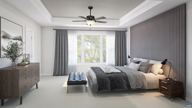 carpeted bedroom with a tray ceiling and ceiling fan