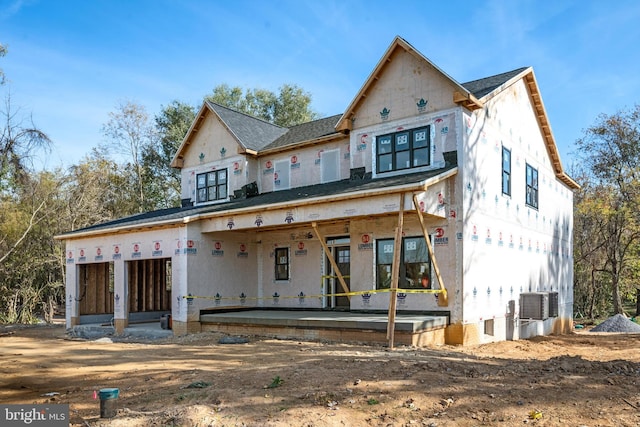 view of front of property featuring covered porch and central air condition unit