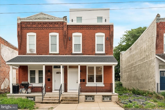 view of front of home featuring covered porch