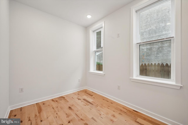 empty room featuring hardwood / wood-style flooring