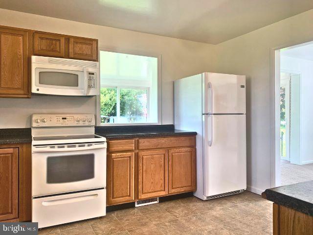 kitchen with white appliances