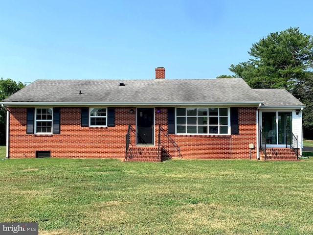 single story home with a front yard