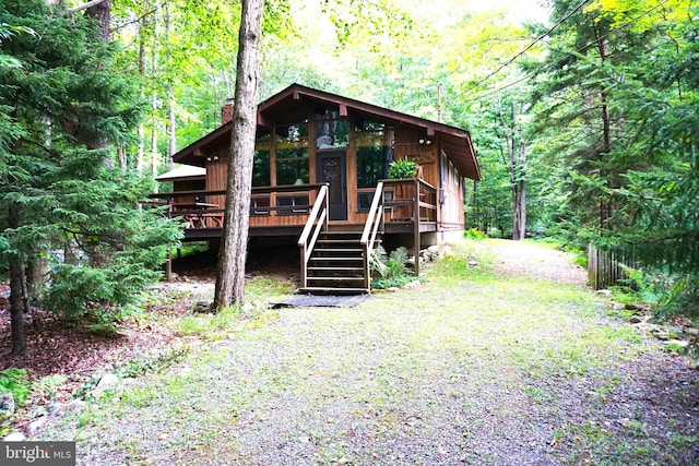 view of front of home with a wooden deck