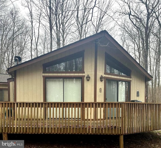 exterior space featuring a wooden deck