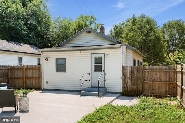 rear view of house featuring a patio area