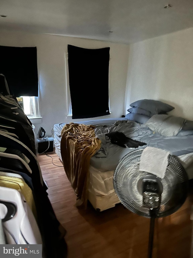 bedroom with wood-type flooring