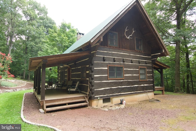 view of home's exterior with a deck