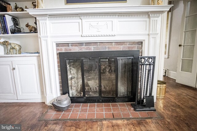 interior details featuring hardwood / wood-style flooring