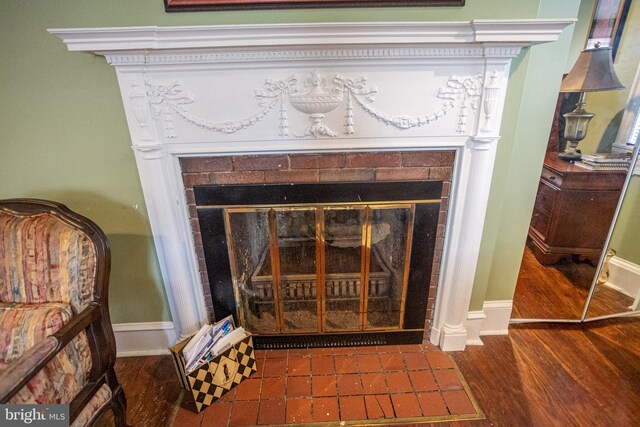 details with a tile fireplace