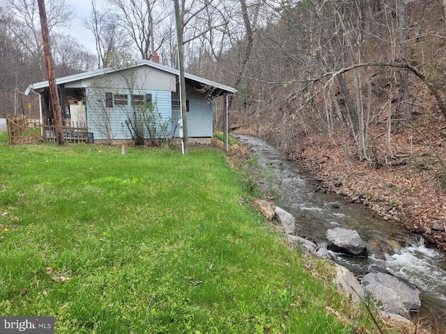 view of yard with a water view