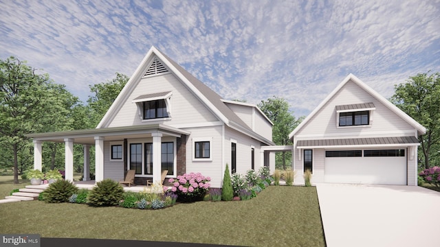 modern farmhouse with a garage, a front lawn, and a porch