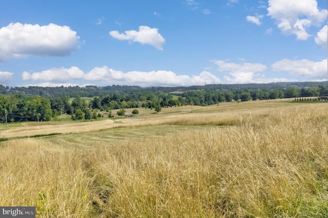 exterior space with a rural view