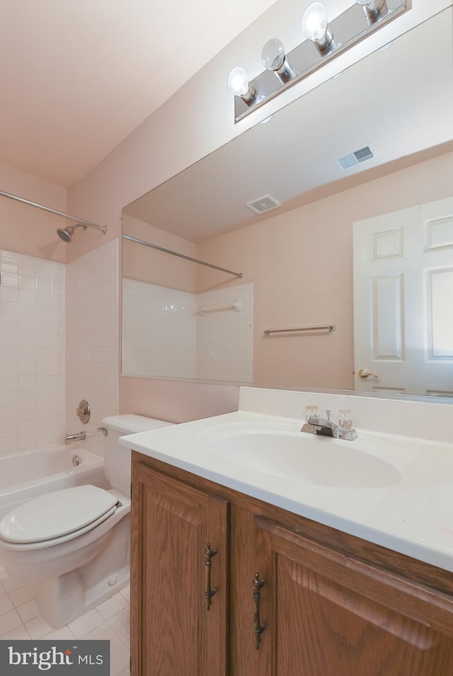 full bathroom featuring vanity, tub / shower combination, tile patterned floors, and toilet