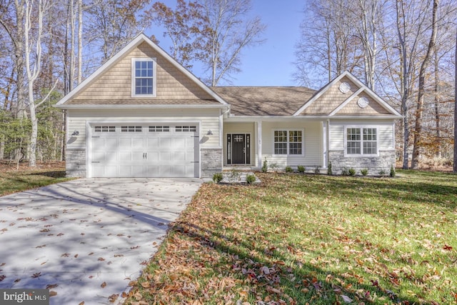 craftsman-style house with a garage and a front yard