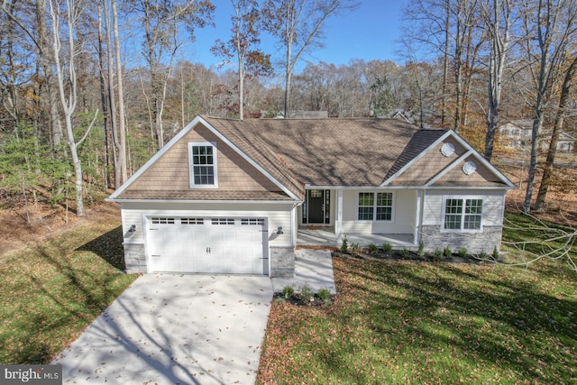 craftsman-style house with a garage and a front lawn