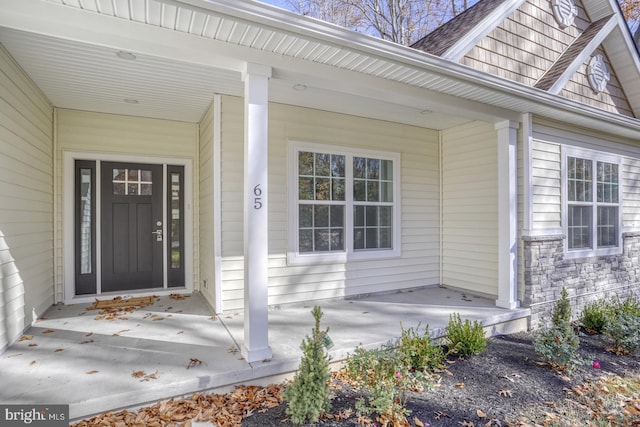 entrance to property with a porch