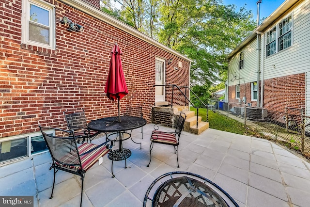 view of patio featuring central AC