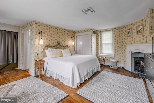 bedroom featuring wood-type flooring