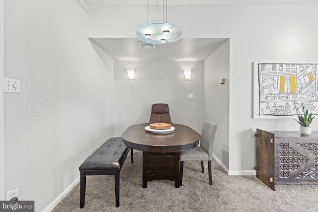 view of carpeted dining room