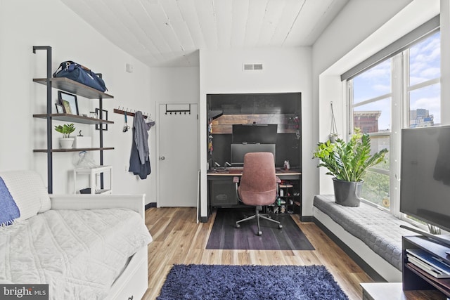 home office with wood ceiling and light wood-type flooring