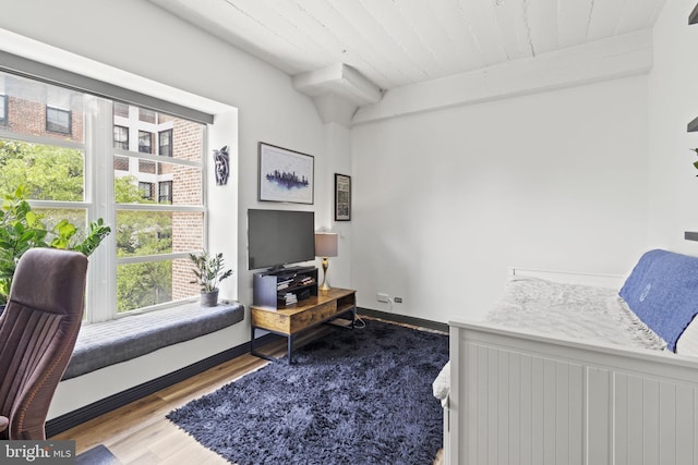 bedroom featuring hardwood / wood-style flooring and wooden ceiling