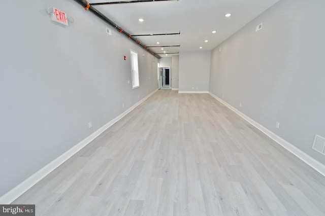 basement with light wood-type flooring