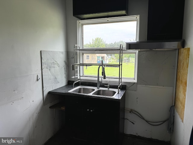 kitchen featuring sink, plenty of natural light, and extractor fan