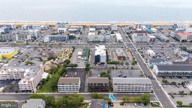 drone / aerial view with a water view and a city view