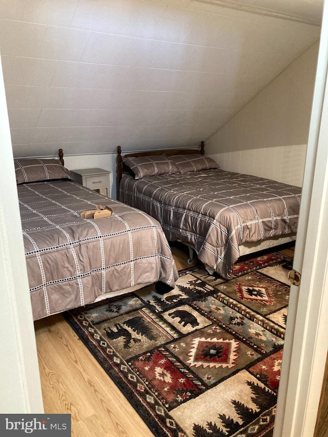 bedroom featuring hardwood / wood-style flooring