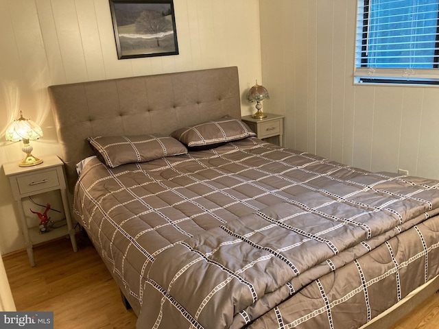 bedroom featuring hardwood / wood-style flooring