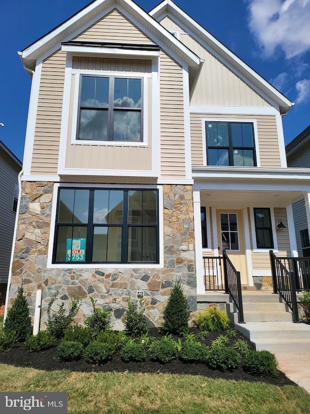 view of front of property featuring covered porch