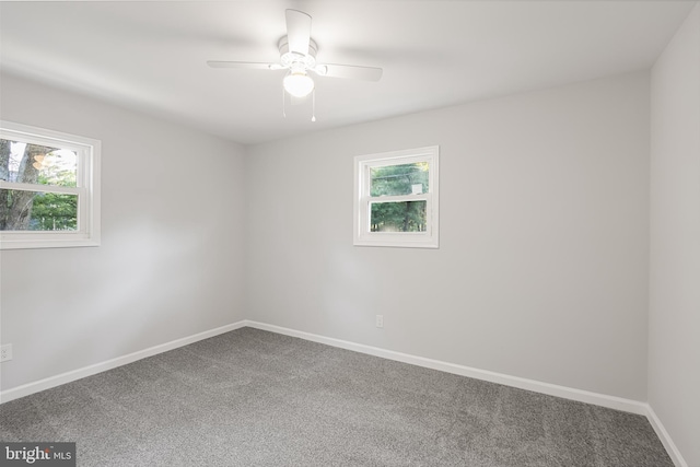 unfurnished room featuring carpet and ceiling fan