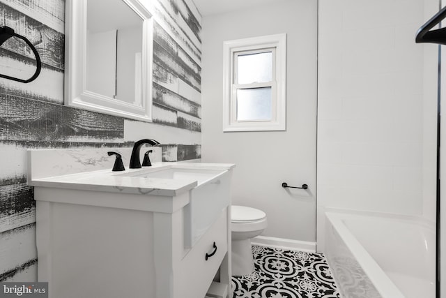 bathroom with vanity and toilet