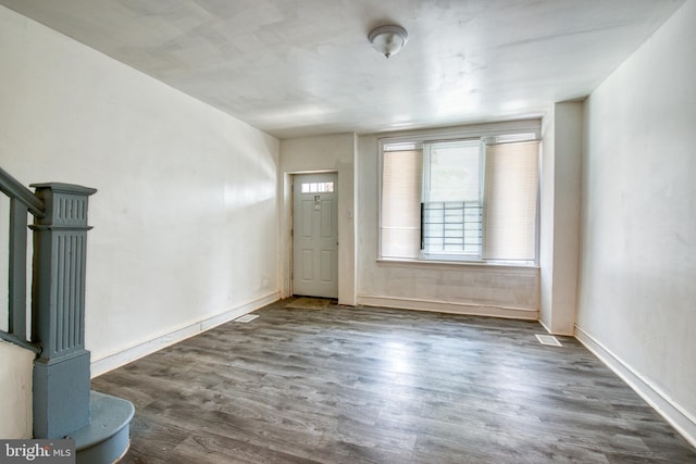 entryway featuring dark wood-type flooring