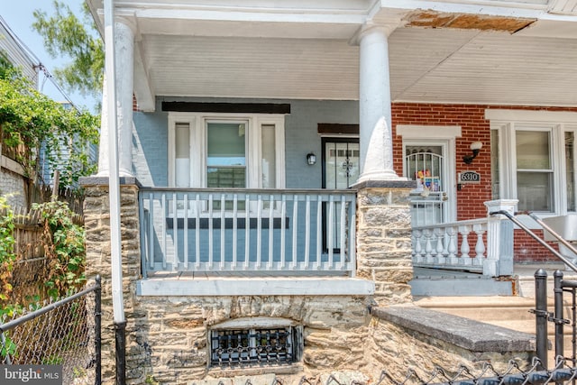 entrance to property with covered porch