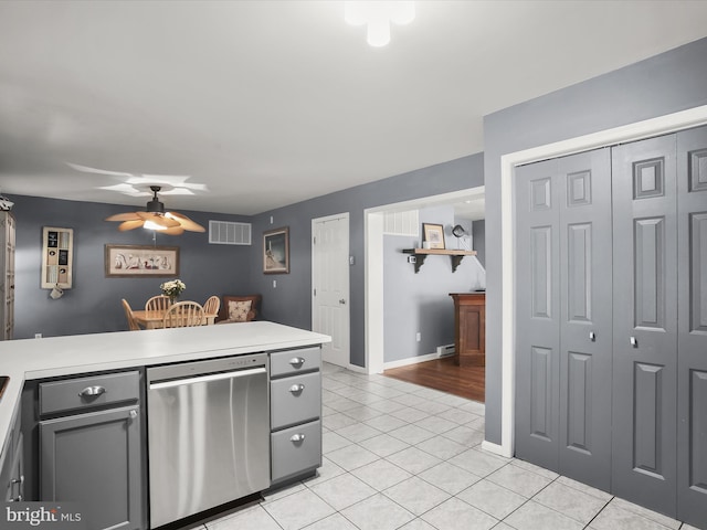 kitchen with ceiling fan, dishwasher, light tile patterned flooring, and gray cabinets