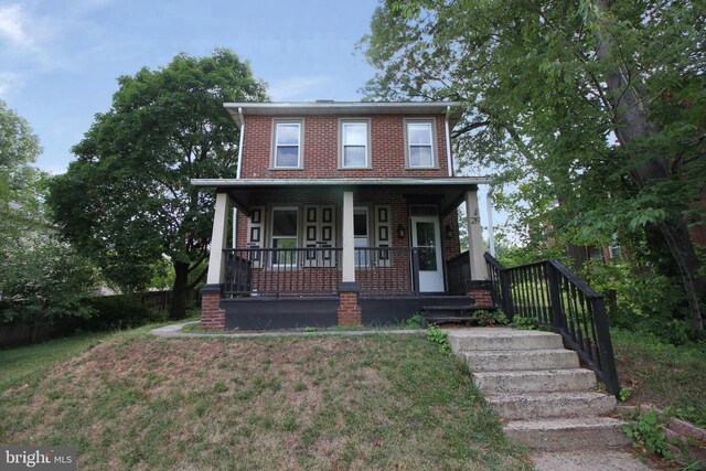 view of front facade with covered porch