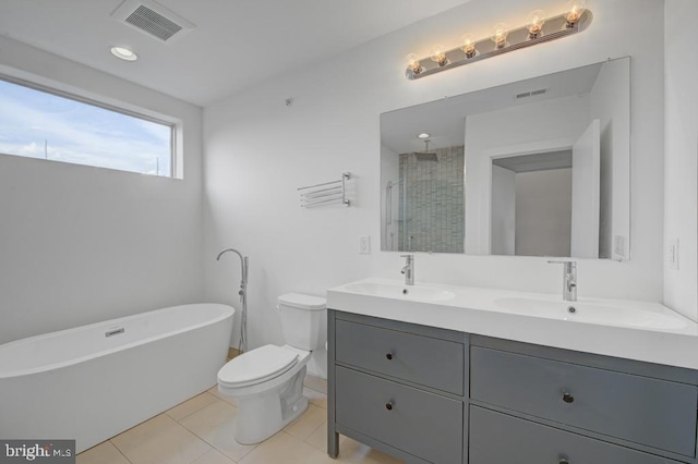 full bathroom featuring tile patterned floors, toilet, vanity, and shower with separate bathtub