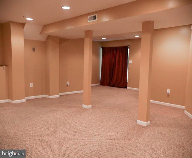 basement with light carpet