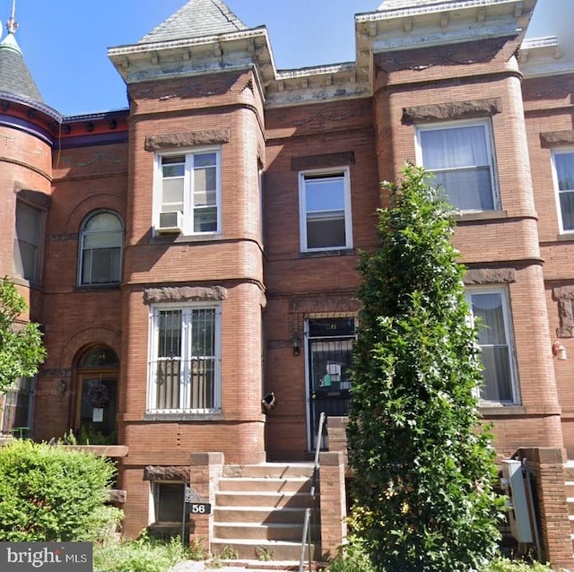 view of front of home featuring cooling unit